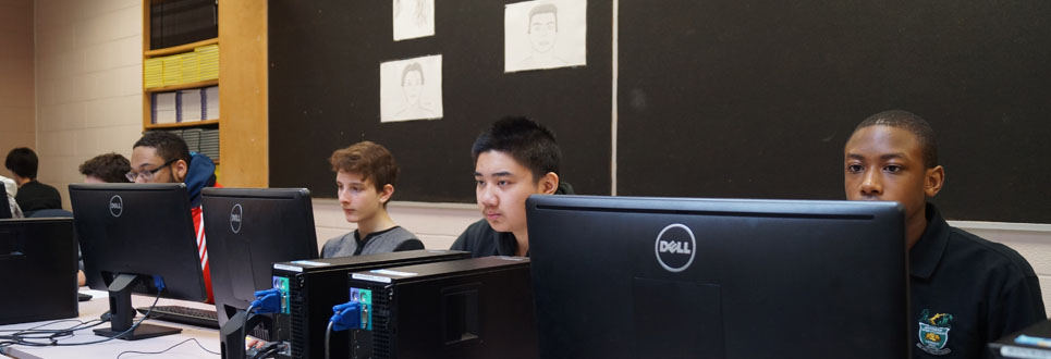 students using desktop computers